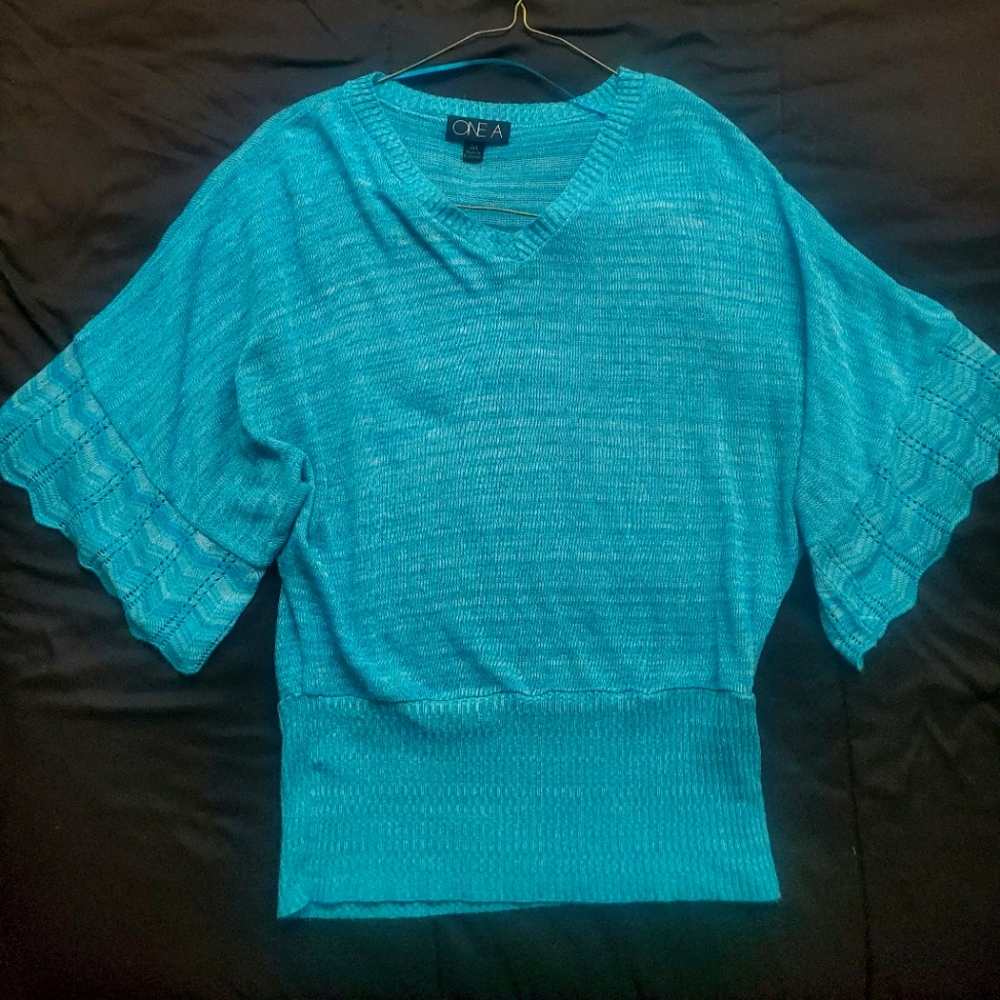 One A baby blue top